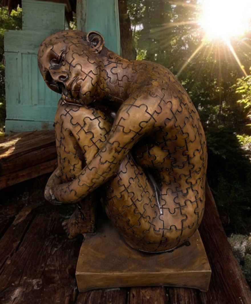 Puzzle parçalarından oluşan insan figürü resmi